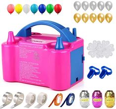 an assortment of party supplies including balloons, confetti maker and other items for decoration