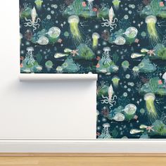 a wallpaper with an octopus and jelly fish pattern