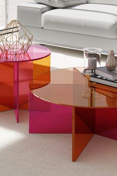 Elevate the sophistication of your living space with Modloft's chic and modern Side and Coffee Table. Boasting a sleek design, this contemporary furniture piece is perfect for updating your home decor and making it truly unique. Transform your home today with Modloft. #coffeetable #sidetable #barbiehome #modernfurniture Pink Orange Round Table, Acrylic Modular Table, Jonathan Adler Lucite Coffee Table, Metal Color Table, Hk Living Glass Side Table, Retro Glass Tables, Colorful Small Table, Furniture Pop Of Color, Abstract Sofa Table