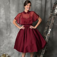 *Brand New. No Tags, Never Worn! Tiny Snag On Capelet From Hanger* The Luna Dress In An Elegant Burgundy Red Brushed Cotton For A 1940s Style. The Sweetheart Bodice Features Princess Seams And A Banded Waist With Pointed Empire Seam While Adjustable Double Spaghetti Straps Allow For A Perfect Fit. The Gathered Swing Skirt Billows Past Your Knees While Hidden Side Pockets Keep A Bit Of Moonlight At Your Side. A Removable Mesh Capelet Flows Around Your Shoulders While A Sweet Classic Collar Secure Unique Vintage Dresses, 1940s Style, Red Dresses, Princess Seams, 1940s Fashion, Princess Seam, Brushed Cotton, Burgundy Red, Swing Dress