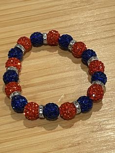 Blue and orange rhinestone bracelet. Gift for her. Wrist size (can make any size needed). 10mm beads. Wedding Bracelets, Wedding Jewelry Bracelets, Blue And Orange, Rhinestone Bracelet, Wedding Bracelet, Bracelet Gift, Wedding Jewelry, Gift For Her, Gifts For Her