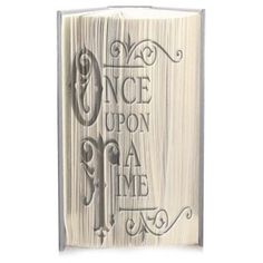 an open book with the words once upon a time on it