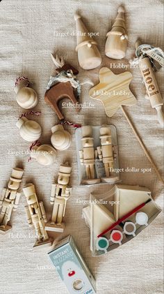 wooden toys are laid out on the bed with instructions to make them look like they have been made from wood