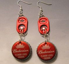 two red bottle caps are attached to silver earwires, with the words budweiser on them