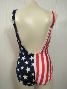 "Vintage 1980s American flag swimsuit or bathing suit. Made of red, white and blue Lycra/Nylon. Most likely a Speedo, but has no label. Size large. Measures: 28\" around the waist 31\" around the hips 29\" overall length In excellent unused condition." American Flag Swimsuit, Vintage Swimsuit, Vintage Swimsuits, Dec 30, Women Swimsuits, Womens Swimwear, Bathing Suit, Vintage Clothing, American Flag