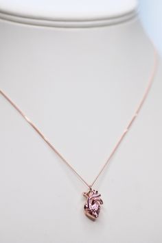 "Anatomical Human Heart Charm Necklace Rose Gold, Medicine Student Gift Idea, Doctor and Nurse Jewelry, Anatomically Correct Human Heart Necklace 3D, Very realisitc, anatomically correct, Rose Gold over Sterling Silver Human Heart pendant necklace. Will make a great gift for wife or girlfriend birthday, Mother's Day or even a Halloween party. Heart size: 17,30 mm x 10,80 mm ( 0 ,68\" x 0,42\") Charm weight: 3.93g All jewelry comes in an elegant jewelry gift box ALSO AVAILABLE IN GOLD AND SILVER Mother's Day Heart Necklace Gift, Rose Gold Heart Pendant Necklace For Mother's Day, Rose Gold Heart Pendant Charm Necklace For Mother's Day, Mother's Day Rose Gold Heart Necklace With Initial Pendant, Rose Gold Heart-shaped Jewelry With Rose Design, Human Heart Necklace, Doctor Necklace, Doctor Jewelry, Doctor And Nurse