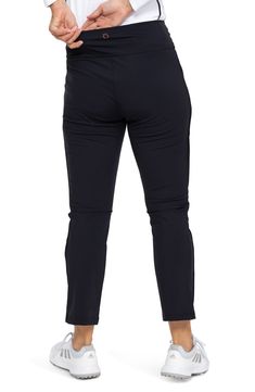 Lightweight, UPF-protective Italian fabric brings moisture-wicking comfort to stretchy, ankle-cropped golf pants featuring a smoothing wide waistband. 26" inseam; 14 1/2" leg opening; 9 1/2" front rise; 12" back rise UPF 50+ sun protection Moisture-wicking fabric engineered for dryness and comfort Antimicrobial fabric engineered to inhibit the growth of odor-causing germs 65% recycled nylon, 35% Lycra® spandex Dry clean or machine wash, tumble dry Imported This product meets Nordstrom Sustainabl Golf Bottoms With Go-dry 4-way Stretch, Moisture-wicking Athleisure Bottoms For Golf, Stretch Moisture-wicking Golf Bottoms, Moisture-wicking Stretch Golf Bottoms, Athleisure Stretch Bottoms For Golf, Stretch Athleisure Bottoms For Golf, Stretch Athleisure Activewear For Golf, Athleisure Activewear For Golf, Black Ankle-length 4-way Stretch Bottoms