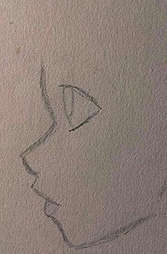 a drawing of a woman's face on the wall