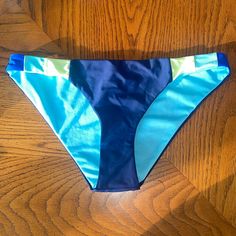 Bathing Suit Bottoms By Cyn & Luca. Shades Of Blue And Lime Green. Nwt Spring Blue Color Block Bottoms, Blue Stretch Color Block Swimwear, Blue Color Block Stretch Swimwear, Blue Color Block Stretch Bottoms, Blue Color Block Bottoms For Summer, Fitted Color Block Blue Bottoms, Blue Color Block Bottoms For Beach, Swimming Bathing Suits, Bathing Suit Bottoms