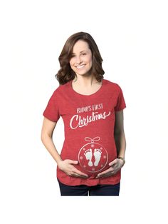 a woman wearing a red t - shirt with the words happy christmas written on it