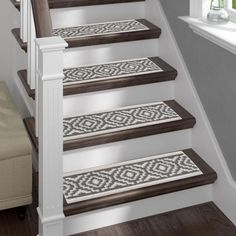 the stair treads are decorated with decorative designs