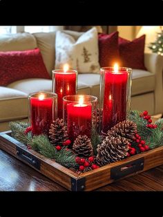 a tray filled with candles on top of a wooden table