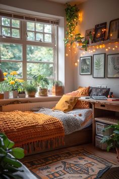 a bed room with a neatly made bed and lots of plants on the windowsill