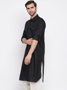 VM By VASTRAMAY Men's Black Cotton Blend Pathani Style Kurta Elevate your traditional wardrobe with the VM By VASTRAMAY Men's Black Cotton Blend Pathani Style Kurta. This elegant kurta combines classic style with modern comfort, making it perfect for festive occasions, family gatherings, or casual outings. The black cotton blend fabric ensures a soft and comfortable fit while providing a sophisticated look. Key Features Classic Pathani style design Comfortable cotton blend fabric Full sleeves wi Classic Black Formal Kurta, Casual Black Festive Kurta, Formal Black Cotton Kurta, Black Long Sleeve Winter Kurta, Black Semi-formal Kurta For Festive Occasions, Black Semi-formal Kurta For Winter, Black Semi-formal Winter Kurta, Pakistani Kurta, Black Kurta