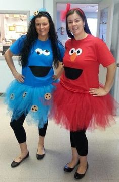 two women in costumes standing next to each other