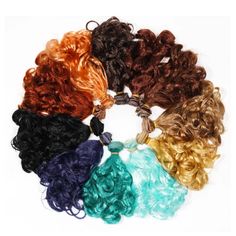 many different colored curly hair on a white background