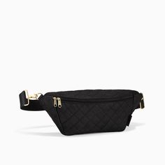 a black quilted fanny bag on a white background