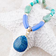 Genuine Aventurine, magnesite, amazonite and jasper. Length is 30" + 2" with lobster clasp closure. Pendant is 1.75" in length. Crafted and finished by hand. Blue Jasper, Necklace Brands, Jasper Pendant, Lobster Clasp, Pendant Necklace, Pendant, Blue