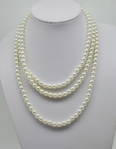 This is a vintage pearl necklace designer signed Sarah Coventry. It is a single strand of faux pearls with has a drop of 29", which can be worn many different ways. It dates from the 1960's/70's and is in excellent condition. White Pearl Long Necklace For Formal Occasions, Formal White Pearl Long Necklace, Vintage White Long Pearl Necklace, Classic Long Necklace For Formal Occasions, Vintage Pearl Necklace, Pearl Necklace Vintage, Vintage Pearl, Sarah Coventry, Vintage Pearls