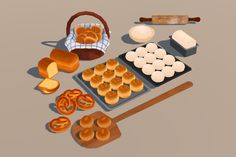 an assortment of pastries and breads on trays next to a wooden spatula