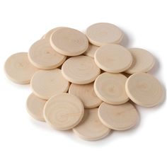 small wooden discs are stacked on top of each other