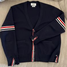 Thom Browne Merino Wool Cardi In Great Condition Luxury Blue Sweater For Workwear, Luxury Blue Sweater For Work, Classic Navy Sweater For Spring, Blue Luxury Long Sleeve Cardigan, Luxury Blue Long Sleeve Cardigan, Luxury Long Sleeve Blue Cardigan, Thom Browne Cardigan, Thom Browne Sweater, Thom Browne