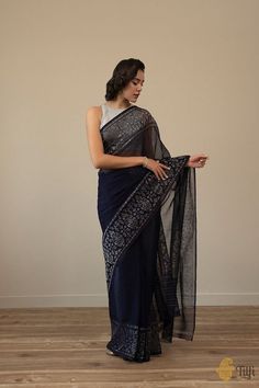 Damini - Exceptional, gossamer, yards of luxury. Awe-inspiring artistry set against a plain bodied drape makes for an enrapturing Banarasi classic. This incredibly light and magnificent pure cotton saree is an exceptional piece, handcrafted to perfection with beautiful roopa sona real zari and spellbinding design influences. Sari Dress, Deep Navy Blue, Blouse Neck, Blouse Neck Designs, Black Linen