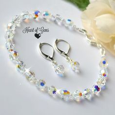 Bracelet and earring set are made of pure crystal beads with an aurora borealis affect. Pearl Bangle Bracelet, Bracelet And Earring Set, Crystal Anklet, Beautiful Anklet, Swarovski Crystal Jewelry, Swarovski Crystal Bracelet, Basic Jewelry, Swarovski Crystal Beads, Healing Jewelry