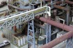 an overhead view of pipes and machinery in a factory