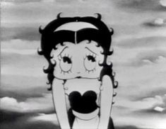 a black and white image of a woman with her mouth open in front of clouds