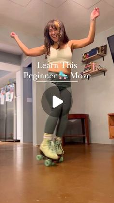 a woman riding a skateboard on top of a hard wood floor