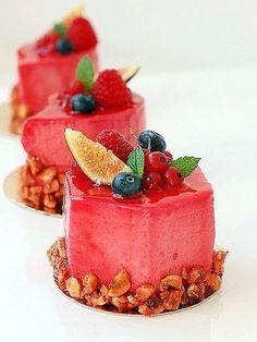 three desserts with fruits and nuts on them