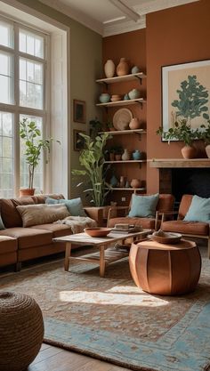 a living room filled with lots of furniture and decor on top of a wooden floor