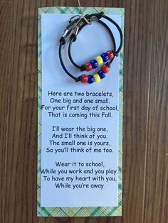 a bookmark with two bracelets on it and a poem written in the middle