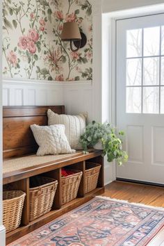 a wooden bench sitting in front of a window next to a rug on top of a hard wood floor