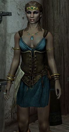 a woman in a blue dress standing next to a wooden wall and wearing gold jewelry