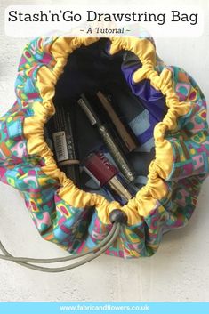 a bag with makeup and other items in it