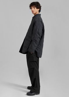 Color: Black Midweight soft woven fabric Relaxed fit High rise Wide leg Front pleat detailing Slant hip pockets Enlarged illusion cargo pockets on leg Darted detailing Zip fly Front button closure Unlined 78% Polyester 20% Rayon 2% Polyurethane Dry Clean By The Frankie Shop. Imported Denim Suit, The Frankie Shop, Frankie Shop, Paris Woman, Leather Texture, Oversized Silhouette, Swimwear Accessories, Quilted Jacket, Cargo Pants