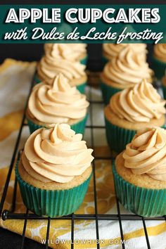 some cupcakes are sitting on a cooling rack with frosting in them and the words, apple cupcakes with dulce de leche frosting