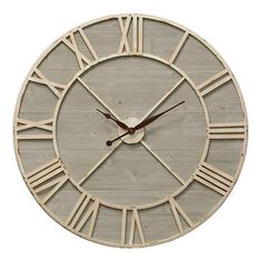 a white clock with roman numerals on the face