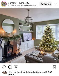 a living room filled with furniture and a christmas tree in front of a tv mounted on a wall