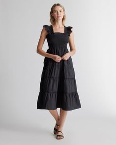 This floaty, flirty, light dress is about to become your fave for summer. Flattering A-line cut, smocked elasticated top, tiered poplin skirt. The sleeveless style has ruffle detailing and all in breathable, natural 100% organic cotton poplin. It's soft, comfy, and the midi-length has the potential to be dressed up or down.  | Quince | Women's Smocked Midi Dress in Black, Size XS, Organic Cotton/Spandex Poplin Skirt, Beach Wedding Guest Dress, Light Dress, Wide Leg Linen Pants, Quince Dresses, Orange Dress, Black Midi Dress, Quince, Fit Flare Dress