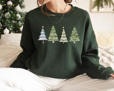 Green Tree Christmas Sweatshirt, Christmas Sweater, Christmas Tree Hoodies, Christmas Crewneck, Holiday Sweaters for Women,Winter Sweatshirt Premium Quality Printed in the USA.  We sell high quality Bonita Cotton and Gildan brands in our sweatshirt and hoodie products. If you have a specific brand selection, please let us know. Please let us know if you have any special request for brand selection. H O W TO O R D E R T - S H I R T 1-) Please, Check and Review all Photos. 2-) Select Your T-shirt Sweaters For Women Winter, Holiday Sweaters, Christmas Crewneck, Green Tree, Winter Sweatshirt, Sweatshirt Christmas, Holiday Sweater, Tree Christmas, Green Trees