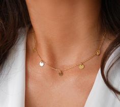 This minimalist layering necklace is made with Gold plated chain adorned with five Gold plated coins.➵ Perfect to wear alone or for layering with more necklaces.➵ The necklace length is ajustable thanks to 5 cm (2 in) extender chain.➵ Sterling silver coin necklace: https://www.etsy.com/fr/listing/536868943/collier-cinq-medailles-collier-argent?ref=shop_home_feat_2--*--*--*--*--*--*--*--*--*--*--*--*--*--*--*--*--*--*--∞ SIZE ∞- Length: Adjustable necklace - around 38 cm (15 in) - 43 cm (17 in).I Dainty Chain Necklace With Coin Pendant, Delicate Charm Necklace With Round Disc, Dainty Charm Necklace With Delicate Chain And Round Disc, Coin Necklace Gold, Boho Wedding Earrings, Silver Coin Necklace, Gold Disc Necklace, Delicate Wedding, Jewel Wedding