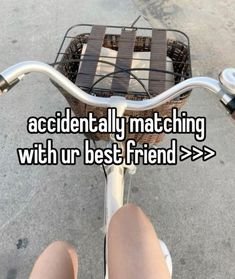 someone is riding their bike with the words accidentally matching with our best friend > >