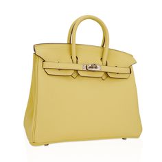 Hermes Birkin 25 bag featured in gorgeous Jaune Poussin. Togo leather with fresh palladium hardware.This gentle pale yellow is lovely twist on a neutral Hermes Birkin bag.Comes with lock, keys, clochette, sleepers, raincoat, signature Hermes box and ribbon.NEW or NEVER .Unparalleled in trust, integrity and service, mightychic offers a beautiful selection of Hermes at your fingertips.final sale BAG MEASURESLENGTH 25 cm / 9.25" TALL 18.5 cm/ 7.25"DEEP 13 cm / 5.25"HANDLESTALL 3"CONDITIONNEW OR NEV Chic Epsom Leather Bag With Lock, Elegant Yellow Bag With Branded Hardware, Elegant Yellow Bags With Branded Hardware, Luxury Yellow Bags With Silver-tone Hardware, Yellow Rectangular Bag With Silver-tone Hardware, Luxury Yellow Bag With Palladium Hardware, Classic Yellow Bag With Silver-tone Hardware, Classic Yellow Bags With Silver-tone Hardware, Elegant Yellow Bag With Silver-tone Hardware