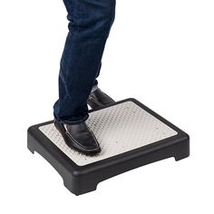 a person standing on top of a scale