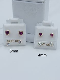 ❤️ 10k Gold earrings telephone heart girl or women studs ❤️ Yellow gold with red and white cubic zirconia 5mm or 4mm ❤️ white stone screws to earring Includes a box Check out my other jewelry ❤️ Aretes teléfono corazones rojos ❤️ Tornillo ❤️ 4mm o 5mm ❤️ Incluye Cajita ❤️ Oro de 10 Kilates ❤️ Piedra roja y blanca zirconia White Pierced Earrings For Valentine's Day, White Cubic Zirconia Earrings For Valentine's Day, White 14k Gold Heart Earrings Gift, 14k Gold White Heart Earrings For Gift, White Heart-shaped Earrings For Birthday, White 14k Gold Earrings For Valentine's Day, White Valentine's Day Earrings, White Screw Back Earrings For Gift, Gold-tone Heart-shaped Pierced Earrings