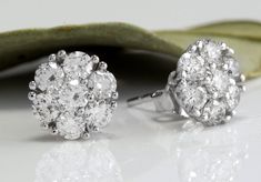 Exquisite 1.60 Carats Natural VVS Diamond 14K Solid White Gold Stud Earrings Amazing looking piece! Suggested Replacement Value $5,800.00 Total Natural Round Cut Diamonds Weight: 1.60 Carats (both earrings) VS1-VS2 / G-H Diameter of the Earring is: 9mm Total Earrings Weight is: 2.1 grams Disclaimer: all weights, measurements and colors are approximate and may vary slightly from the listed dimensions or as seen in the image. All pictures are magnified to show the smallest of details. Please, refe Luxury Round Cut Cluster Earrings For Anniversary, Luxury Cluster Earrings For Anniversary, Luxury Cluster Earrings With Vvs Clarity For Anniversary, Luxury Cluster Earrings With Prong Setting For Anniversary, Luxury Vvs Clarity Cluster Earrings For Anniversary, Luxury Brilliant Cut Cluster Earrings For Anniversary, Gia Certified Cluster Earrings For Formal Occasions, Gia Certified Cluster Earrings For Anniversary, Gia Certified Fine Jewelry Cluster Earrings For Wedding