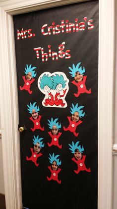 a door decorated with dr seuss and cat in the hat characters